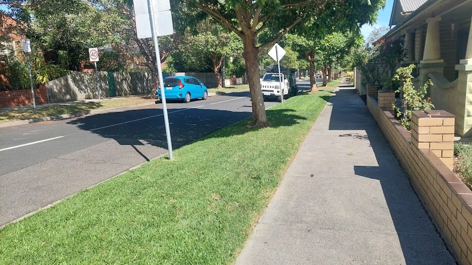 After: Nature strip. Long grass mown back off the footpath and around the hydrant.